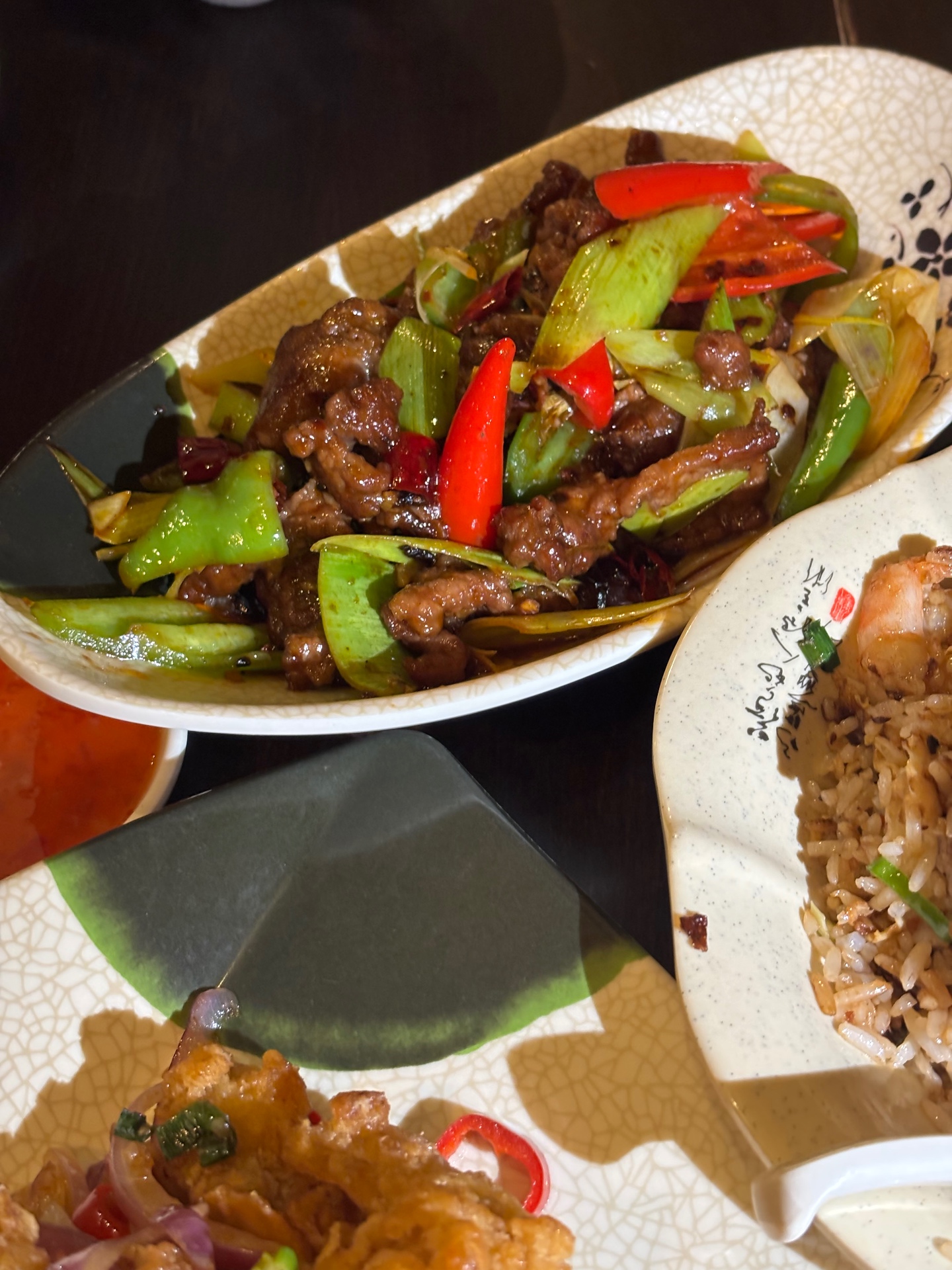 Stir-fried chilli beef with peppers and leek